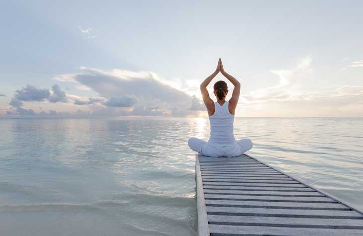woman with pelvic organ prolapse meditating