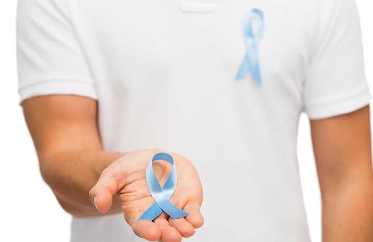 man holding prostate cancer awareness ribbon