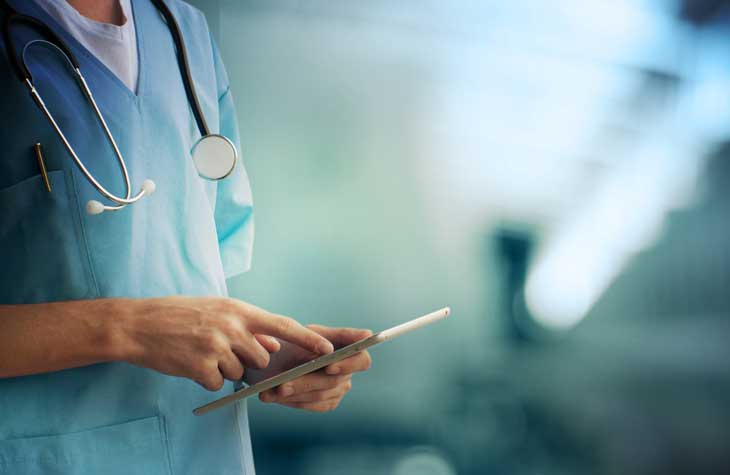 doctor reviewing test results showing testicular cancer